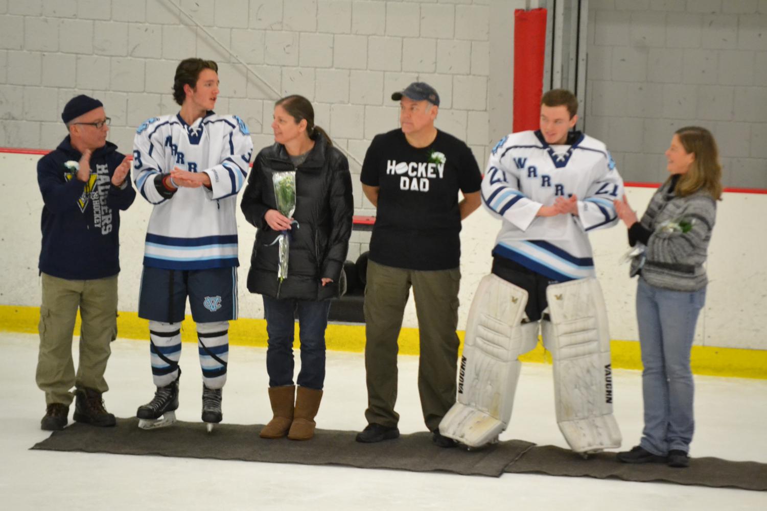 respectively, for their commitment as seniors to the hockey team