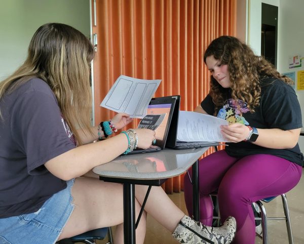 Study buddies: Sitting across from each other, sophomores Marie Yeager (left) and Janna Kline (right) spend time at the end of class preparing for the Literature Keystones. All students enrolled in an English 10 course are required to test for Literature.