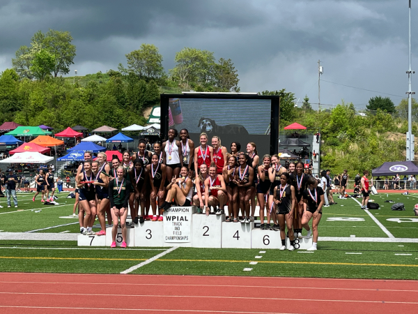 Final race: Standing proud, the girls 4x100 relay team takes the podium at the WPIAL track meet. With their placement, they advanced to state finals, which was the final race for the seniors.