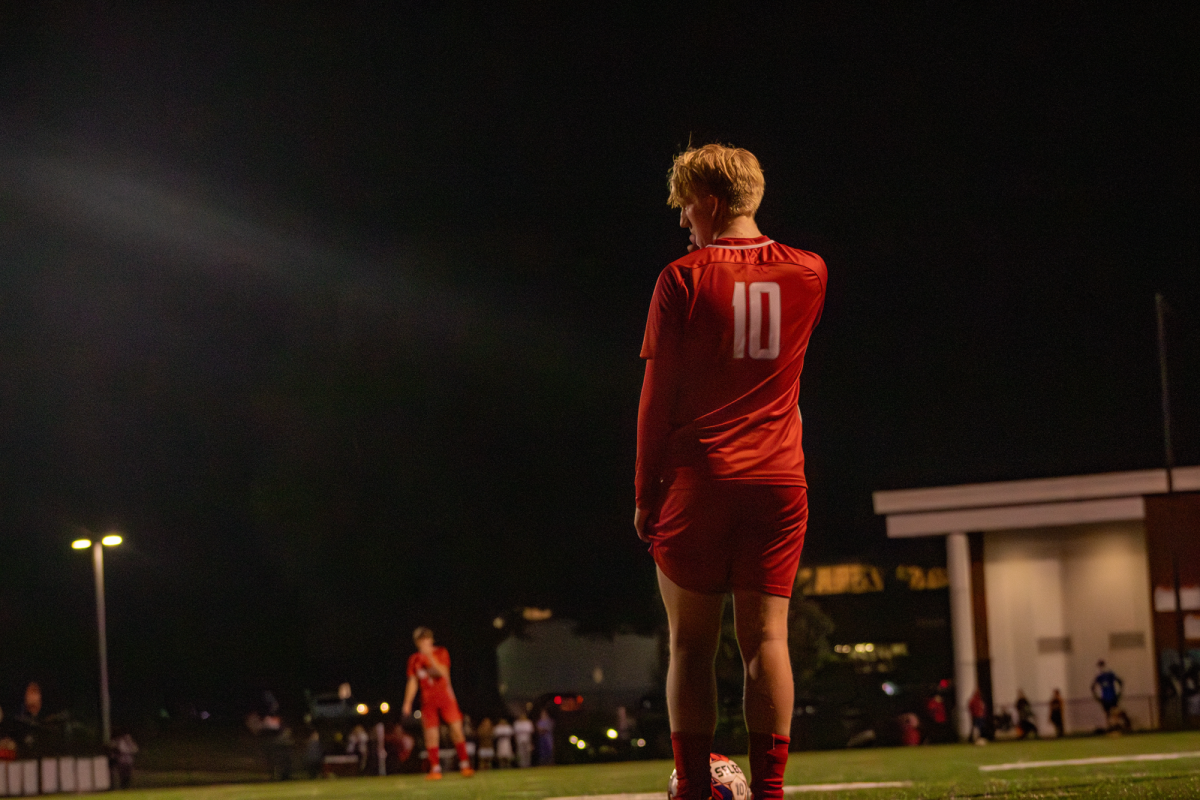 Lining up a pass to one of his teammates, Jaylen Mohrbacher (11) stares intently while listening to the referee tell him where to start an indirect kick, which occurs after a penalty against the other team. During an indirect kick, also called a free kick, the ball has to make contact with another teammate before a shot can be made on the goal. This game was against Eden Christian High School on 10/10, but despite the team’s effort, they unfortunately lost with a score of 3-1.