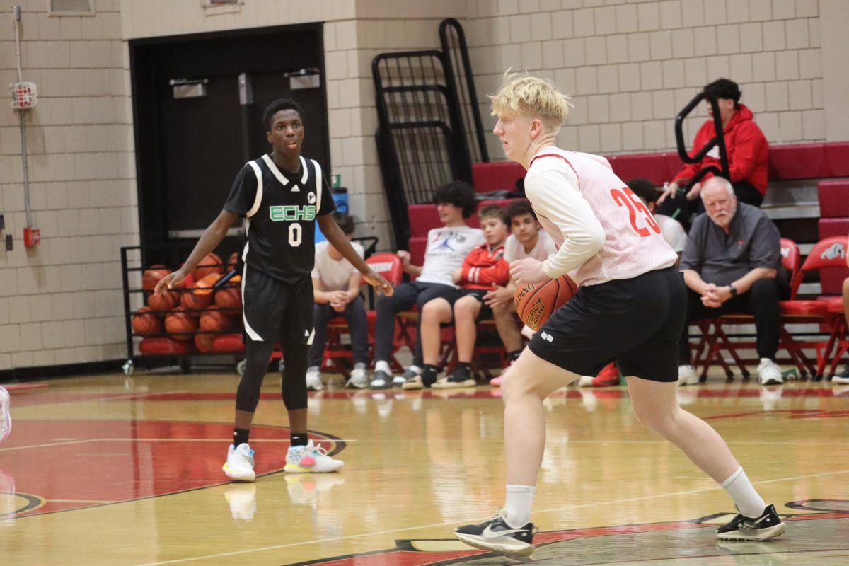 Making a move: About to make a pass, Jalen Mohrbacher (11) looks to see if anyone is open. Basketball takes strategy and it is important to think before someone shoots. 

