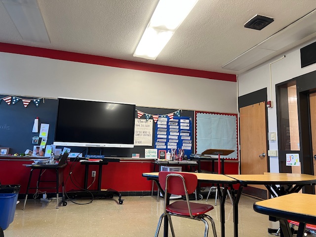 Paint the town red: Krawchyk’s room, sporting its new color, is the guinea pig for what the rest of the classrooms could look like. Variations of the paint have also been considered.